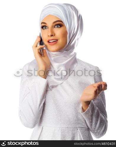 Young muslim woman on white