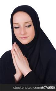 Young muslim woman praying isolated on white