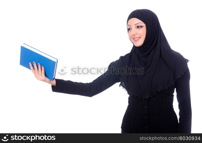 Young muslim woman with book on white