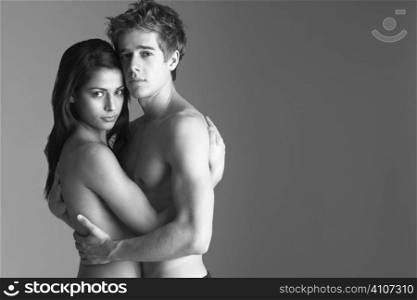 Young Naked Couple Embracing