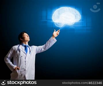 Young neuropathist. Image of male doctor touching with finger media illustration