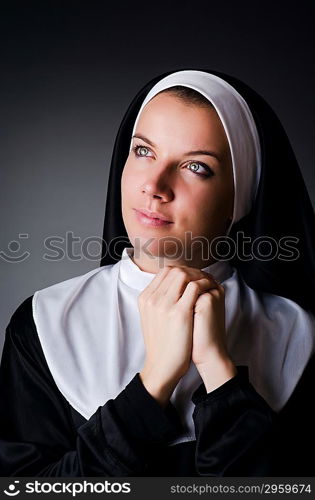 Young nun in religious concept