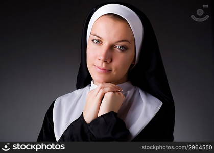 Young nun in religious concept