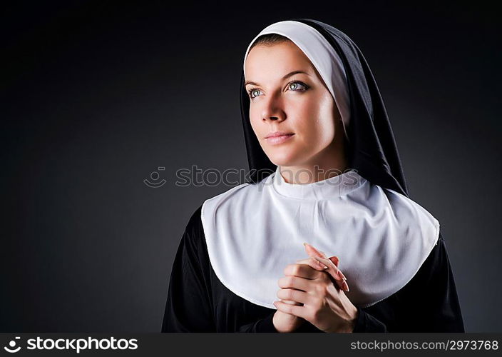 Young nun in religious concept