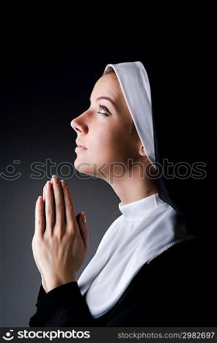 Young nun in religious concept