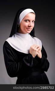 Young nun in religious concept