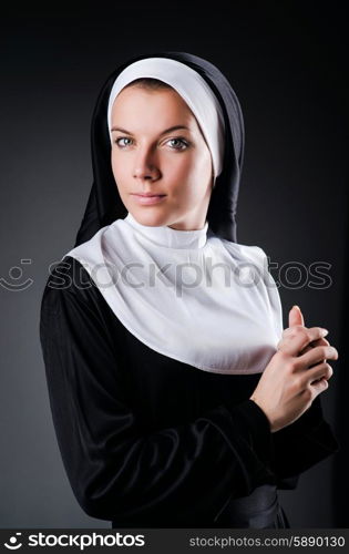 Young nun in religious concept