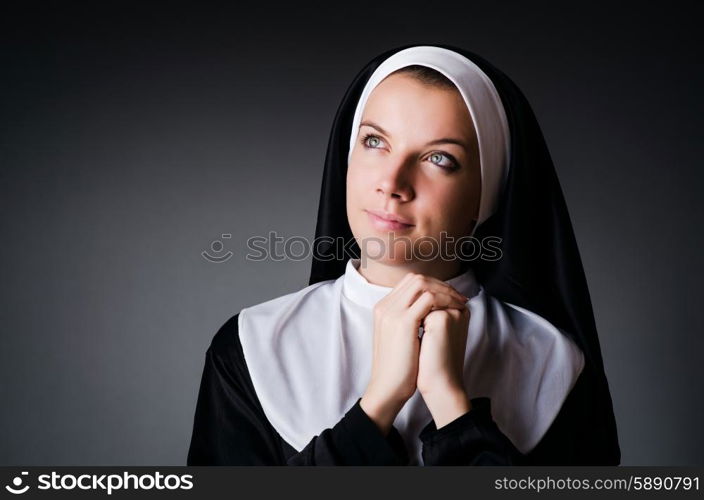 Young nun in religious concept