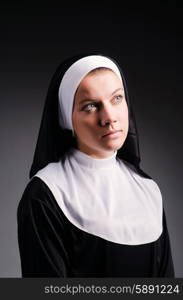 Young nun in religious concept