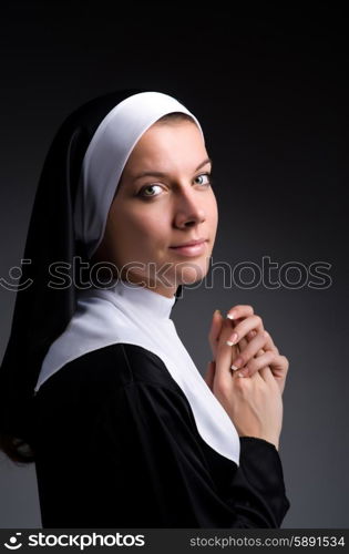 Young nun in religious concept