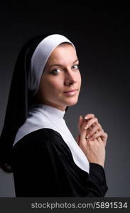 Young nun in religious concept