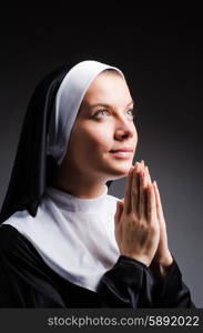 Young nun in religious concept