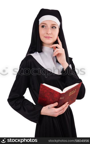 Young nun with bible isolated on white