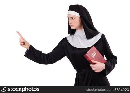 Young nun with bible isolated on white