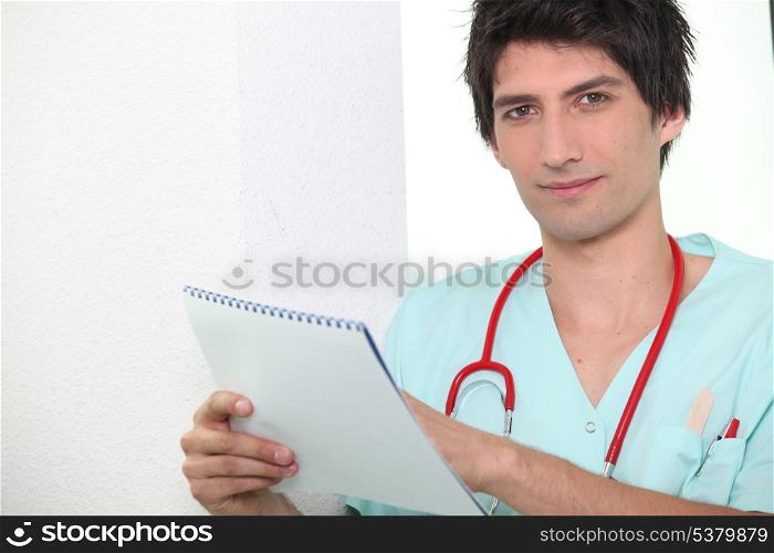 Young nurse checking calendar