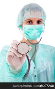 Young nurse holding stethoscope - selective focus on hand