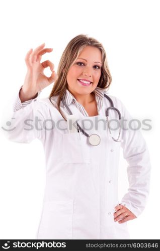 Young nurse signaling ok - isolated over white