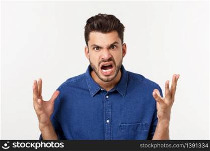 young office worker mad by stress screaming isolated on white. young office worker mad by stress screaming isolated on white.