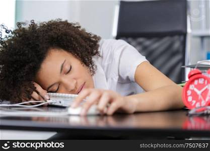 young office worker sleeping