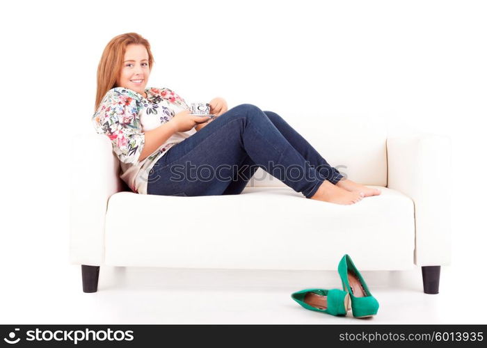 Young overweighted woman relaxing at home