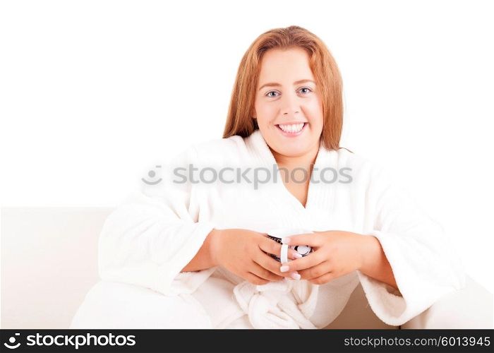 Young overweighted woman relaxing at home