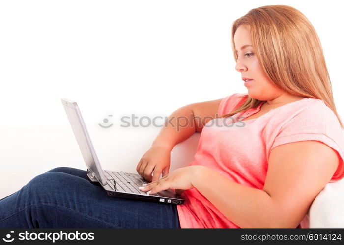 Young overweighted woman relaxing at home