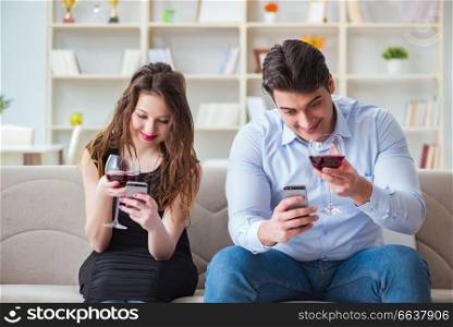 Young pair drinking wine in romantic concept