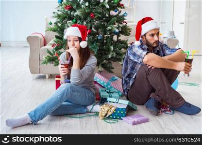 Young pair in conflict situation during christmas night