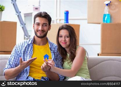 Young pair moving in to new apartment under mortgage
