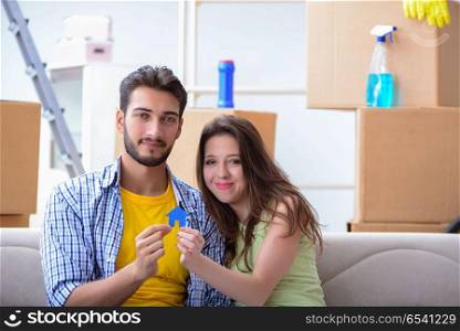 Young pair moving in to new apartment under mortgage