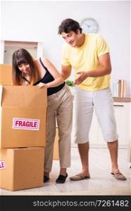 Young pair moving to new flat with fragile things 