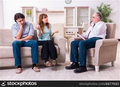 Young pair visiting experienced doctor psychologist . Young pair visiting experienced doctor psychologist