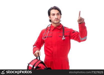 Young paramedic in red uniform isolated on white