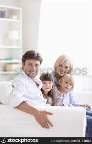 Young parents with children at home