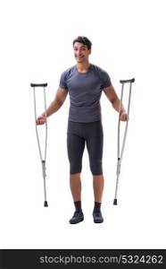 Young patient athlete sportsman suffering an injury trauma with . Young patient athlete sportsman suffering an injury trauma with crutches isolated on white