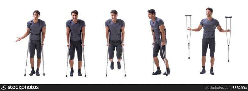 Young patient athlete sportsman suffering an injury trauma with crutches isolated on white. Young patient athlete sportsman suffering an injury trauma with 