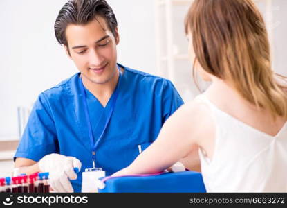 Young patient during blood test s&ling procedure  