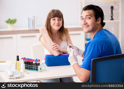 Young patient during blood test s&ling procedure  