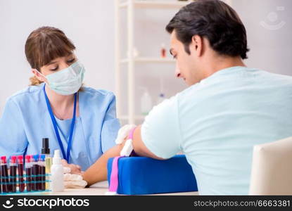 Young patient during blood test s&ling procedure  