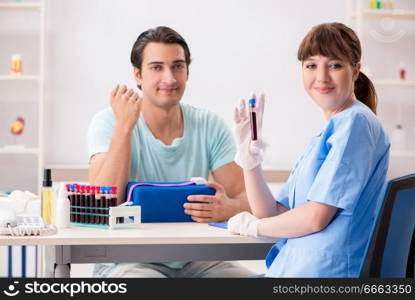 Young patient during blood test sampling procedure  