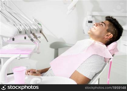 Young Patient in modern dental clinic. High quality photo. Young Patient in modern dental clinic.