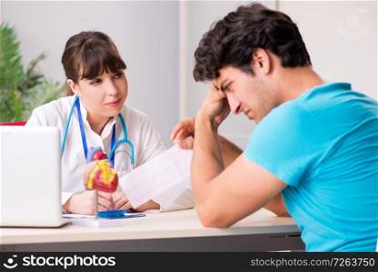 Young patient visiting doctor cardiologist . The young patient visiting doctor cardiologist 