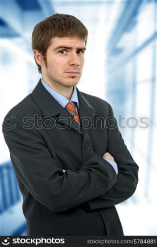 young pensive business man in a office building