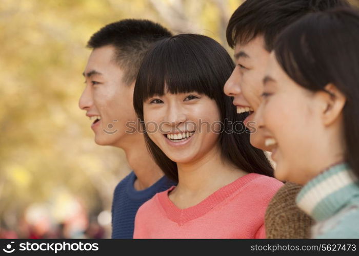 Young people enjoying a park in autumn