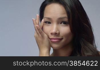 Young people, female teenager, woman, cosmetic, beauty and body care, portrait of happy Asian girl smiling, applying cream for eye skin therapy. 3of16