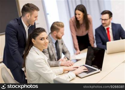 Young people have teamwork by desk in the modern office