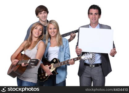 Young people playing the guitar