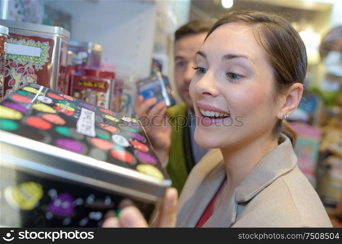 young people shopping in supermarket