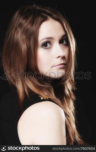 Young people teenage concept - beauty pensive serious woman teenager girl portrait on black