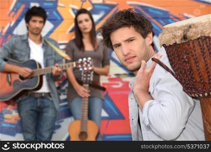 Young people with guitars and drums